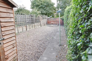South-facing garden with picnic bench is perfect for BBQs; lockable bike storage shed